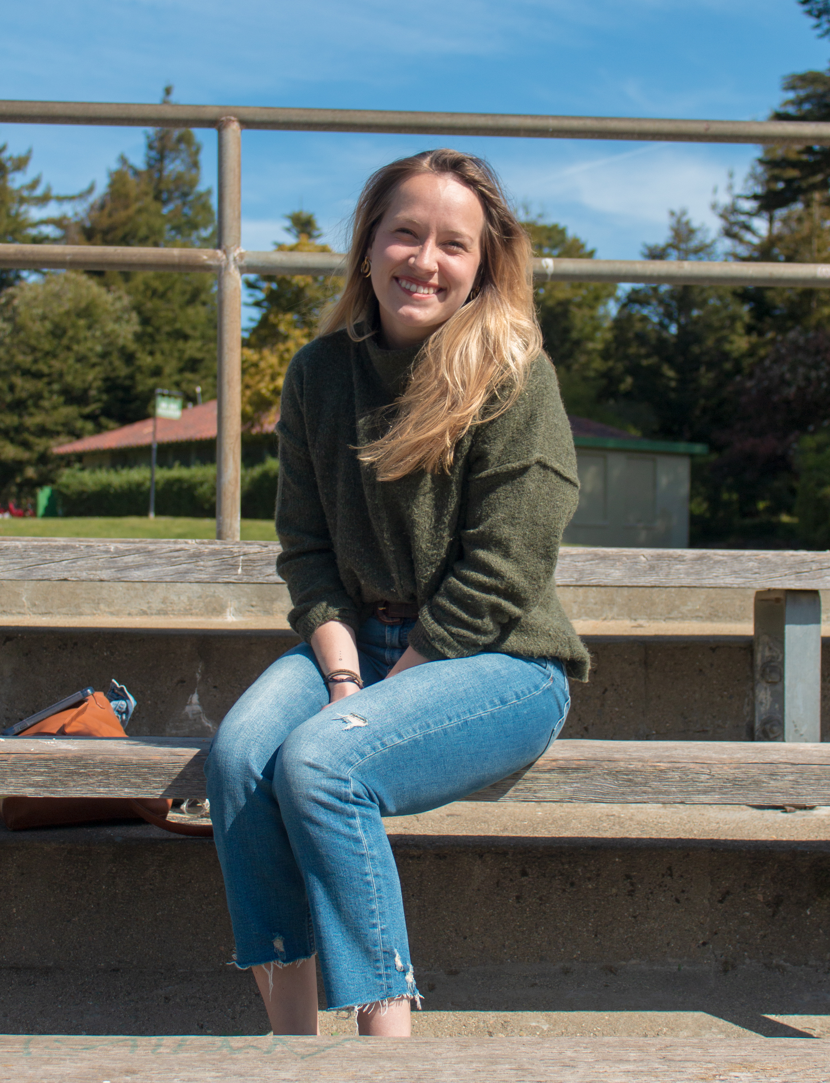 molly sitting on a bench